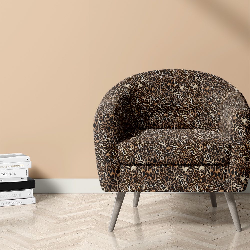 Indian leopard print fabric on chair for maximalist interiors