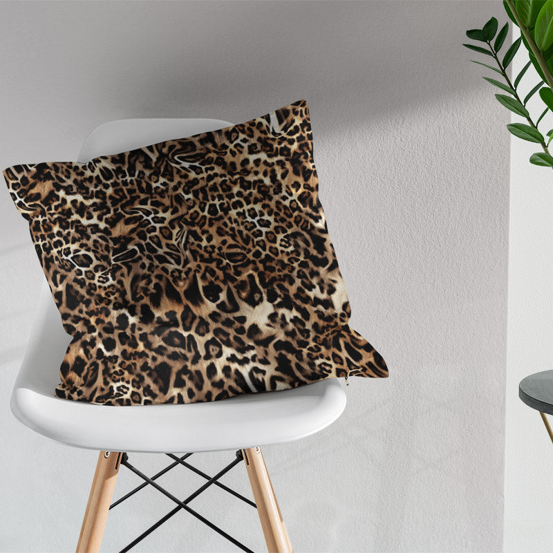 Indian leopard print fabric cushion with decorative animal print design