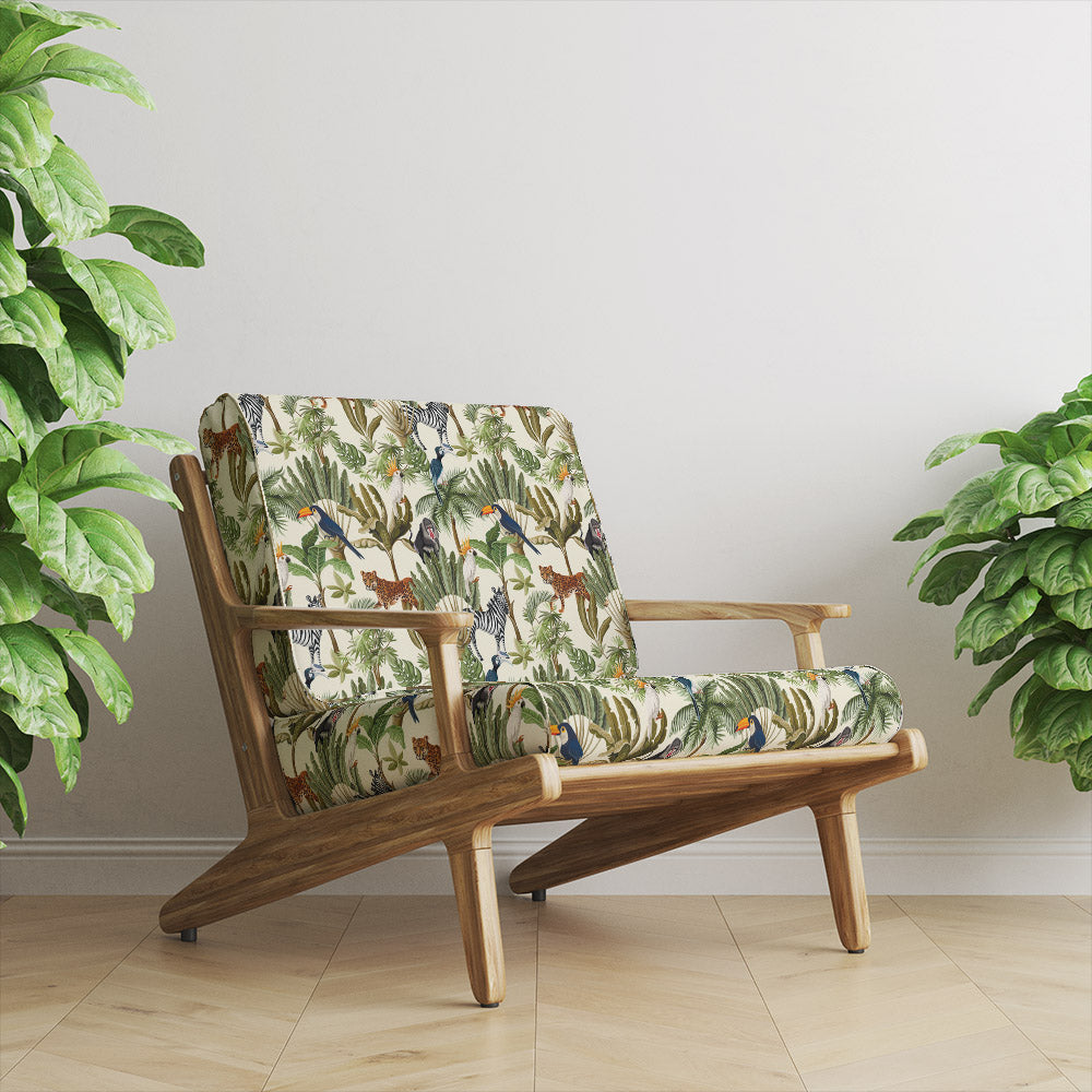 Jungle Animals Crib 5 velvet upholstery fabric shown on a chair with tropical birds and animal print