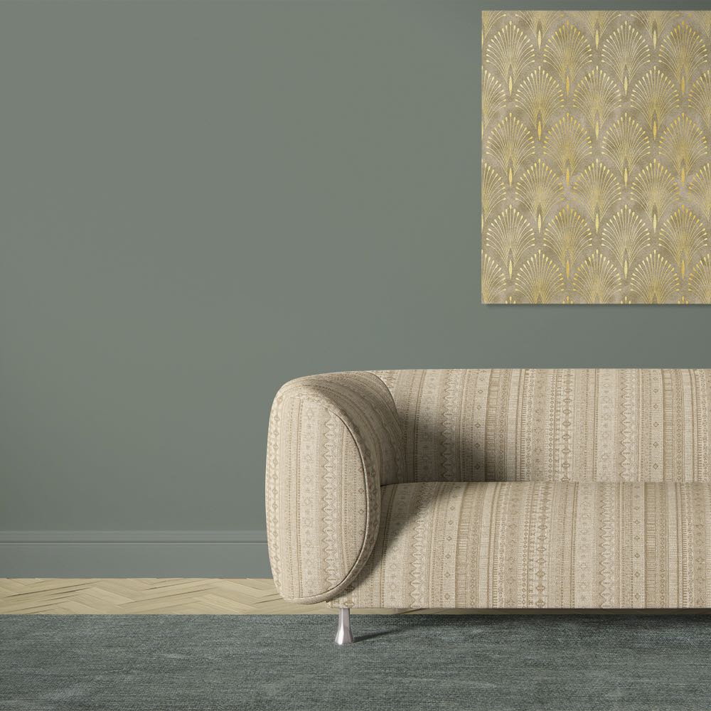 Khenifra Natural velvet upholstery fabric shown on a sofa with vertical geometric stripe design