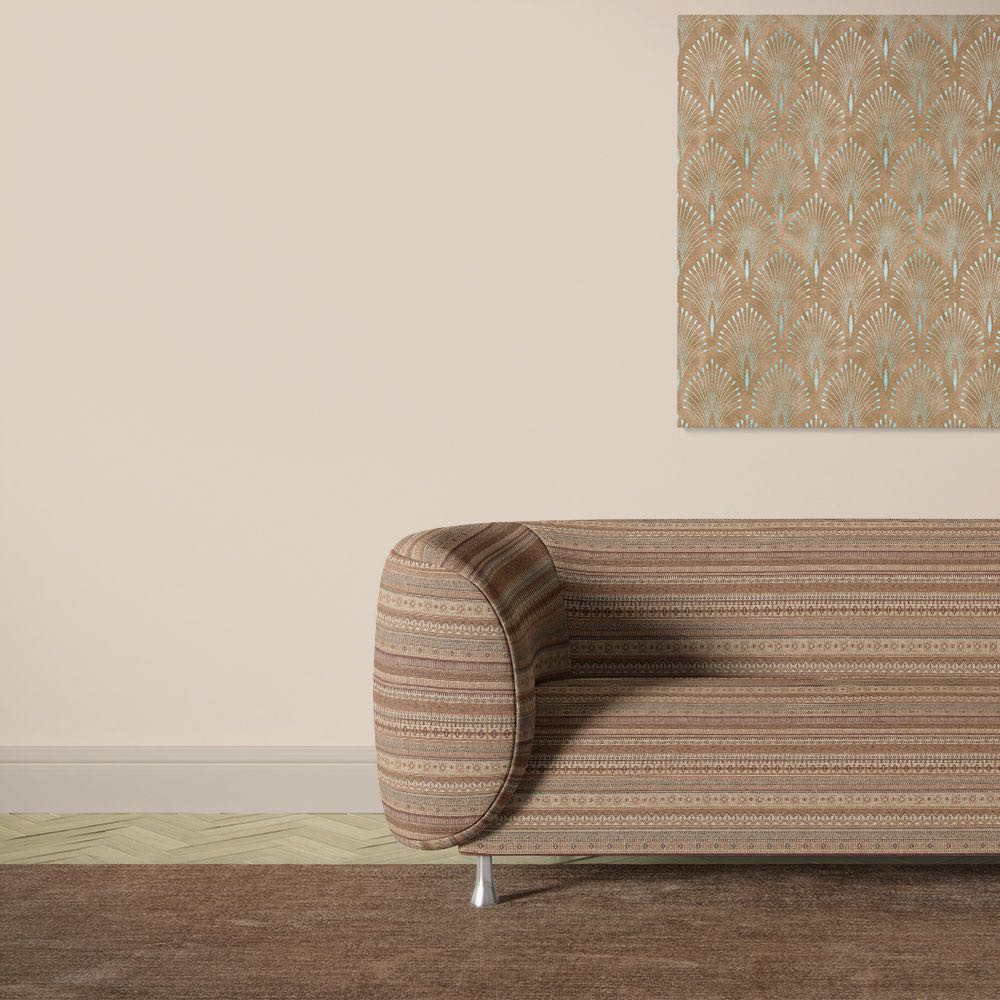 Khenifra Terracotta railroaded velvet upholstery fabric displayed on a sofa with horizontal stripe direction