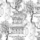 black japanese curtain fabric with intricate toile illustration featuring pagoda, blossom trees and lantern motifs