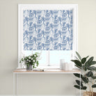 deep indigo japanese toile roman blind printed on cotton linen fabric with intricate scenic detailing across the window