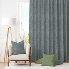 Laguna Denim curtain fabric styled as full-length curtains in a modern living room