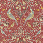 arts and crafts upholstery fabric with birds and floral william morris style pattern in red linen blend