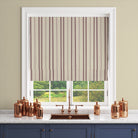 Lowick Stripe burgundy striped curtain fabric made into a Roman blind
