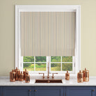 Lowick Stripe green ochre striped curtain fabric shown as a Roman blind