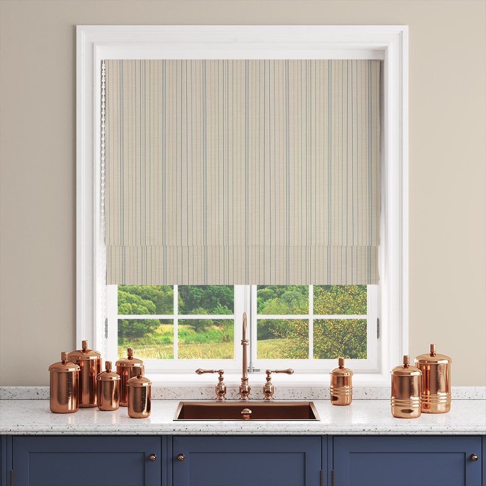 Lowick Stripe powder blue curtain fabric displayed as a Roman blind