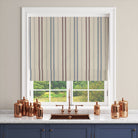 Lowick Stripe red blue striped curtain fabric shown as a Roman blind