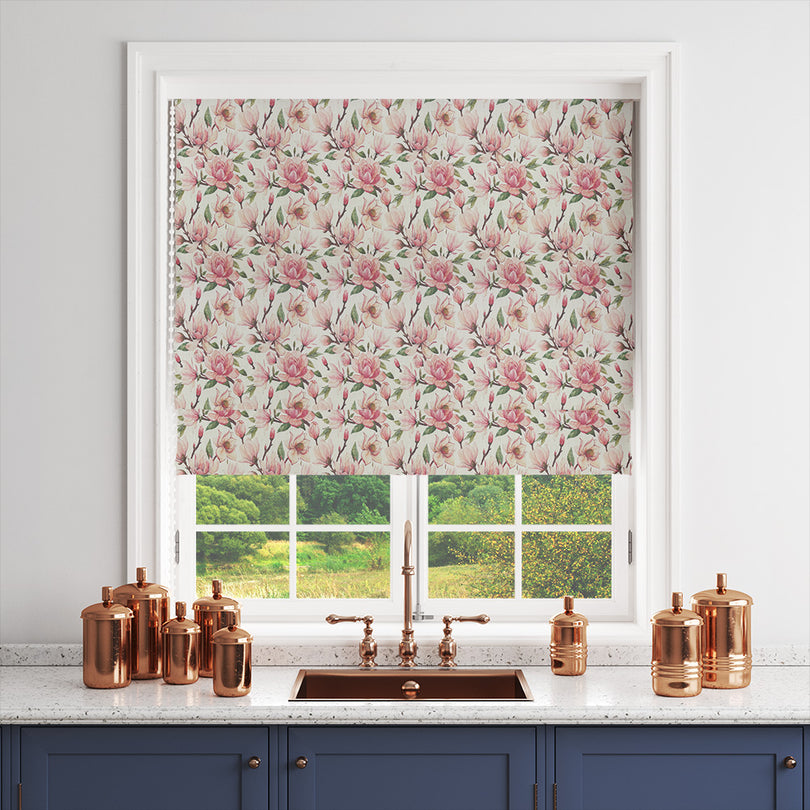 Magnolia Pink Linen Curtain Fabric styled as a Roman blind with floral pattern in soft pink tones