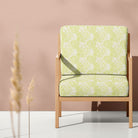 Ochre Marigold fire retardant velvet upholstery fabric shown on a statement chair