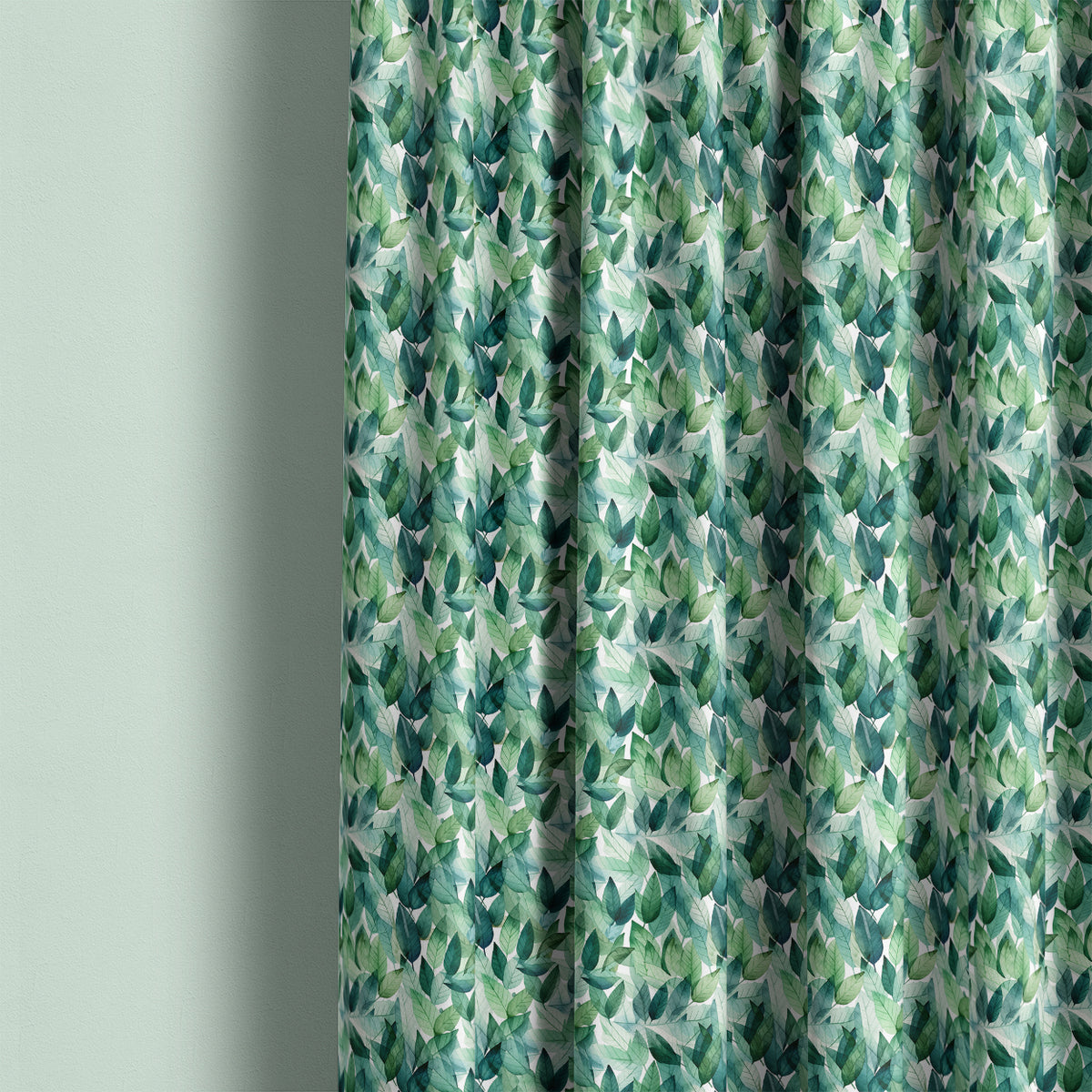 Mercia botanical fabric styled as rich green leaf curtains for a nature-inspired living space