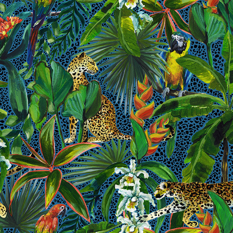 Nelvara jungle velvet upholstery fabric with golden leopards, parrots and lush green foliage on deep blue