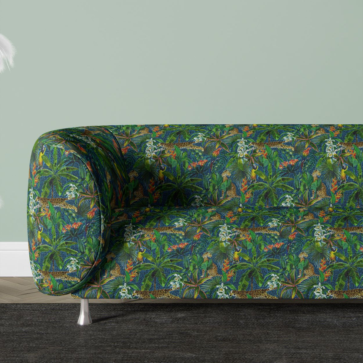 Nelvara Crib 5 jungle velvet shown on a curved sofa for bold commercial and domestic upholstery