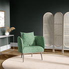 Modern chair upholstered in Newton green geometric upholstery fabric with a contemporary hexagon design