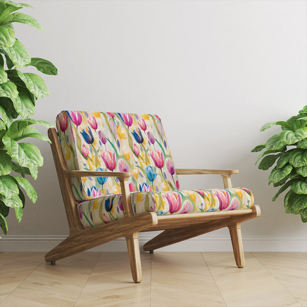 Pastel Flowers fire retardant velvet upholstery fabric shown on a chair in bright pastel floral design
