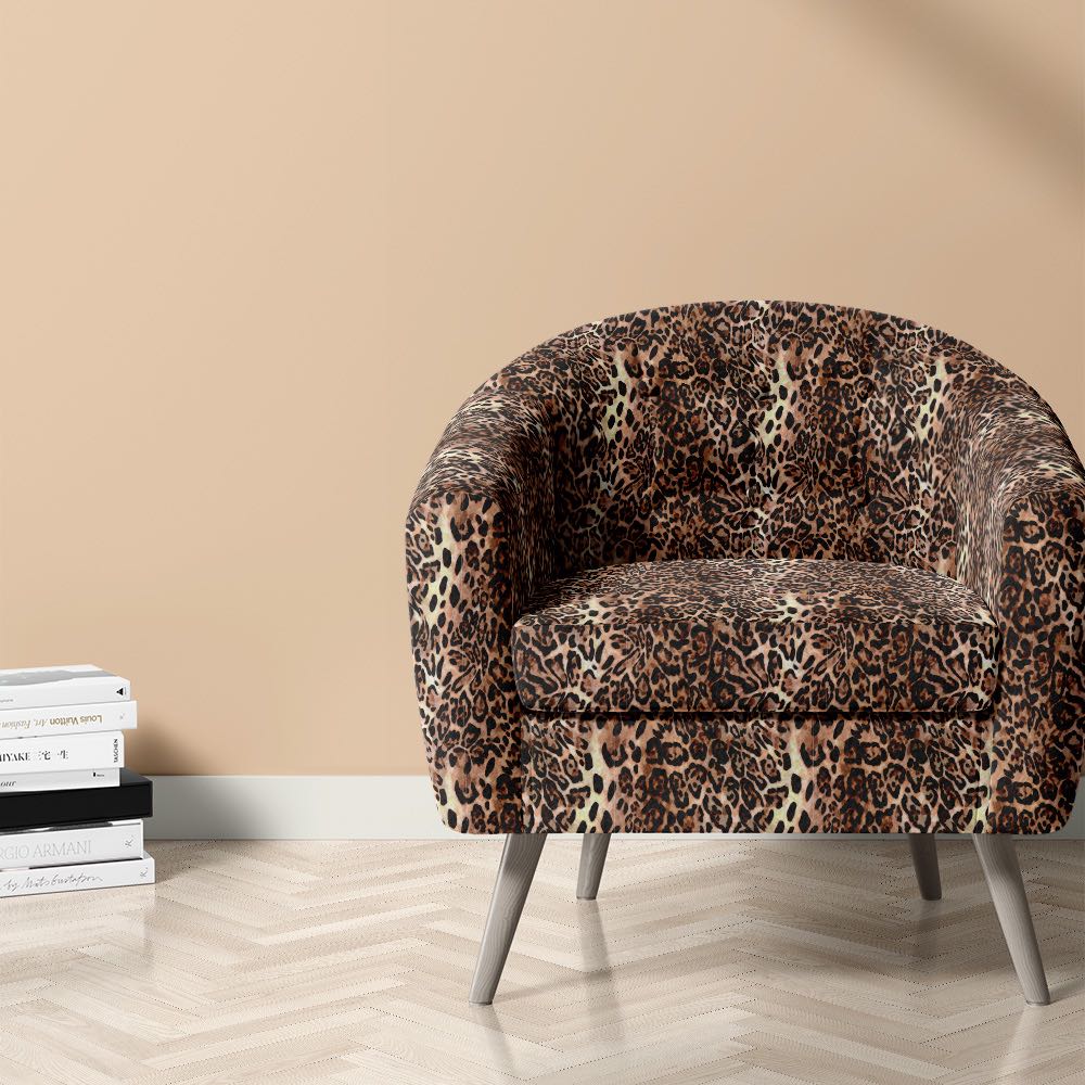 Persian leopard print fabric on chair in a decorative room setting