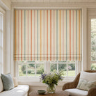 Plano Multi striped linen curtain fabric shown as a Roman blind, colourful striped fabric for statement window treatments
