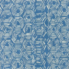 Blue geometric curtain fabric with hexagon print shown flat