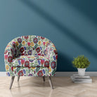 Armchair upholstered in Rosemaling velvet fabric in multicoloured Scandinavian floral design