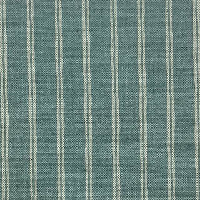 Striped blue and white Rowley Ticking Upholstery Fabric, perfect for home decor projects