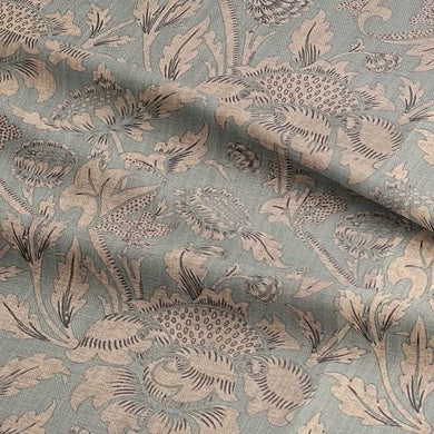 Ethereal Ruskin Curtain Fabric in a dreamy sky blue with delicate celestial motifs