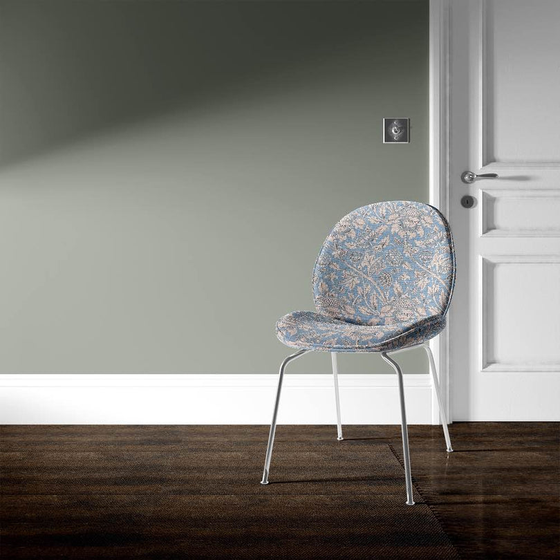 Ruskin Upholstery Fabric in a rich, textured  green color, perfect for adding elegance to any furniture piece