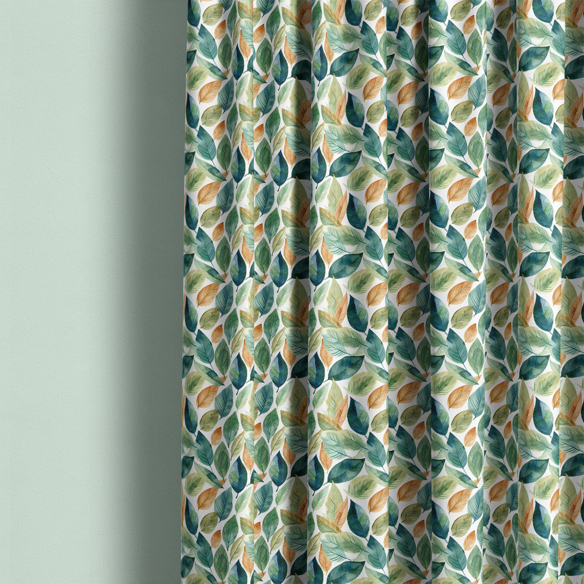 Salcey washable curtain fabric shown as botanical curtains with green, blue and ochre leaves