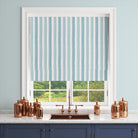 Salem Stripe Sky Roman blind using soft blue striped fabric for an airy window treatment
