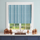 Salem Stripe Teal washable fabric shown as a Roman blind for a bold blue-green interior