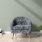 Savanna Indigo Velvet Fabric – indigo velvet floral fabric on chair, styled for interior use