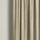 Shellwick Golden art deco linen curtain fabric shown as warm patterned curtains