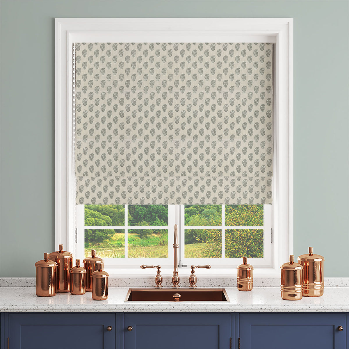 Fennel green paisley fabric shown as a made to measure Roman blind