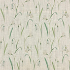 Snowbell Ivory floral linen curtain fabric with green snowdrop stems on a natural woven ground