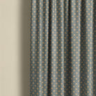 Teal spot curtain fabric featuring classic polka dot pattern, perfect for stylish contemporary window treatments
