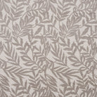 Flat swatch of Stratford Mushroom leaf design upholstery fabric in warm taupe grey
