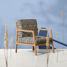 Blue Strawberry Thief Crib 5 velvet upholstery fabric on a traditional statement armchair