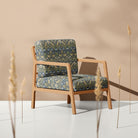 Cobalt William Morris velvet upholstery fabric used on an elegant accent chair