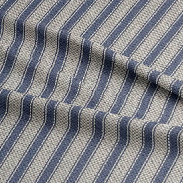 Tetbury Ticking Upholstery Fabric in classic blue and white stripes, perfect for adding a timeless touch to any furniture piece