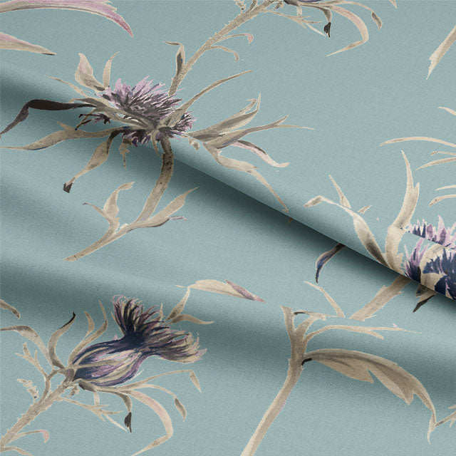 Close-up of Thistle Cotton Curtain Fabric in rich lapis blue color