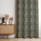 Thornsbury floral linen curtain fabric shown as curtains in black teal, botanical printed linen curtain fabric for made to measure curtains and blinds