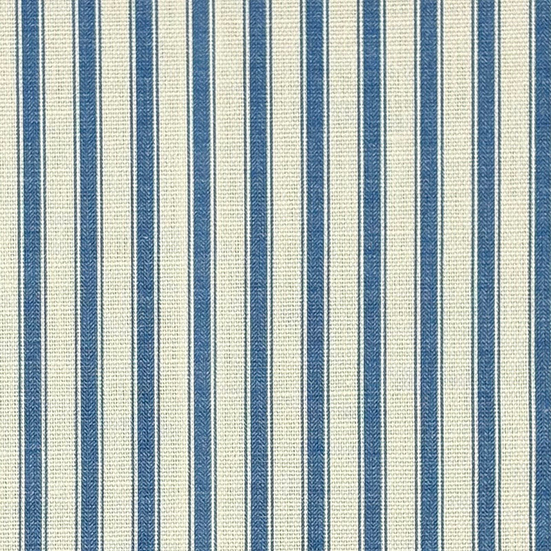Flat image of Ticking Stripe Upholstery Fabric in Denim blue with classic ticking stripe pattern on off-white background.