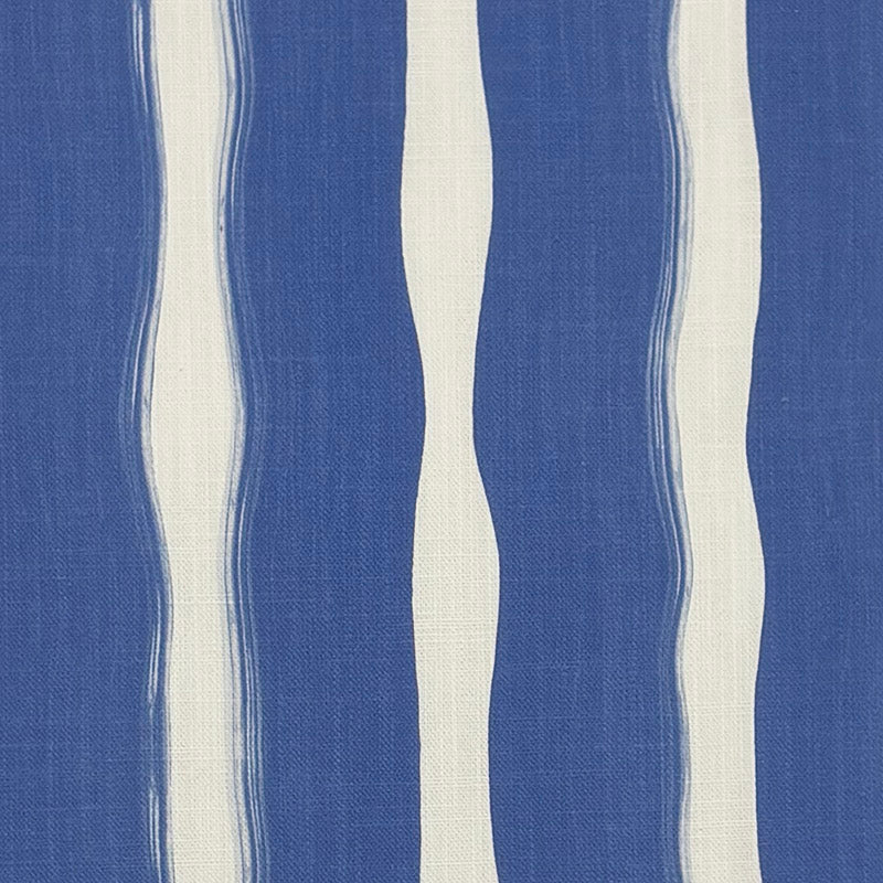 bold blue striped curtain fabric with flowing vertical stripe design on linen curtain fabric