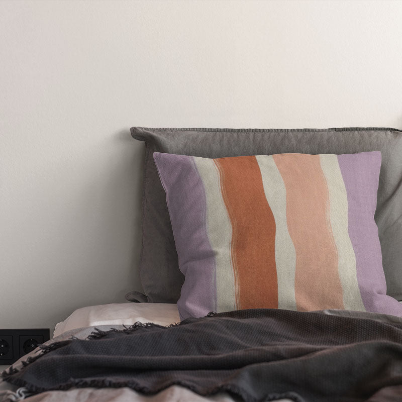 striped curtain fabric cushion in lilac and peach tones with soft blended vertical stripes on linen curtain fabric