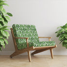 Upholstered chair in Watercolour Foliage Velvet Fabric in Bottle Green – green velvet leaf fabric on mid-century chair