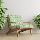 Upholstered chair in Watercolour Foliage Velvet Fabric in Green – botanical velvet upholstery fabric styled on chair