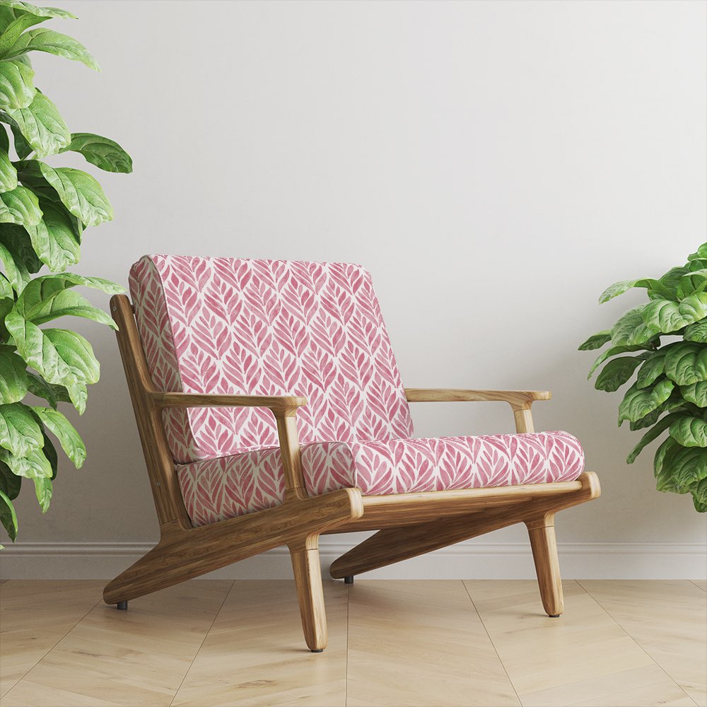 Upholstered chair in Watercolour Foliage Velvet Fabric in Pink – bold pink velvet fabric styled on modern armchair