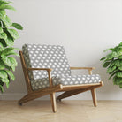 Waverly Black geometric velvet upholstery fabric on chair
