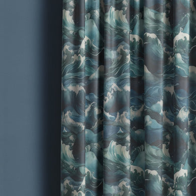 Waves Ink curtain fabric hanging in soft folds showing deep blue and teal wave pattern