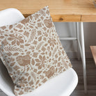 Weston linen curtain fabric cushion showing natural country bird and woodland leaf design